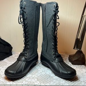 Michael Kors black snow boots.